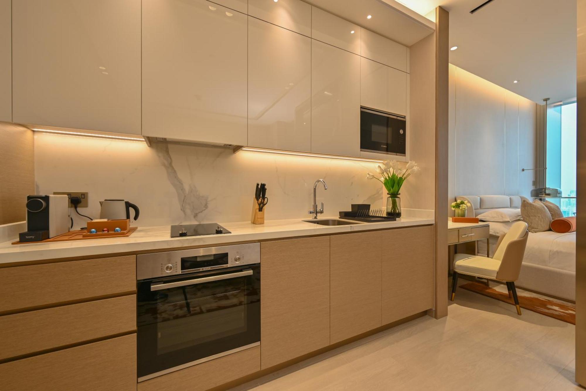 Onyx Rotana Hotel Manama Eksteriør billede A kitchen in a serviced apartment in Hong Kong